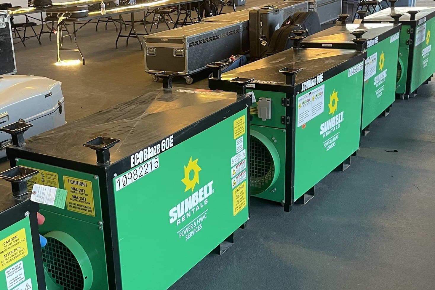 Five green commercial heaters lined up backstage at Ascend Amphitheater before the concert